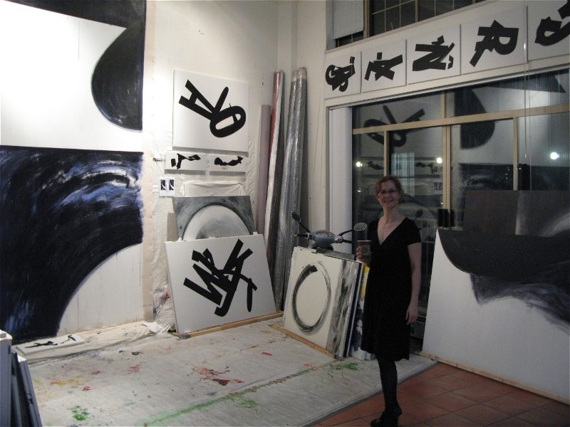 Marta Baricsa with DOLA DIRECTIVIST paintings